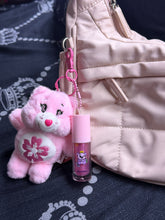 Load image into Gallery viewer, pink sakura care bear lippie charm
